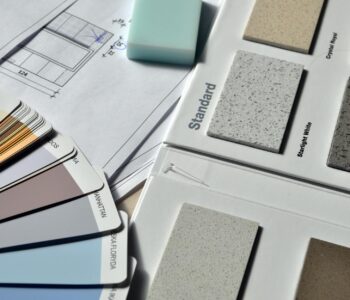 gray standard color book near green eraser